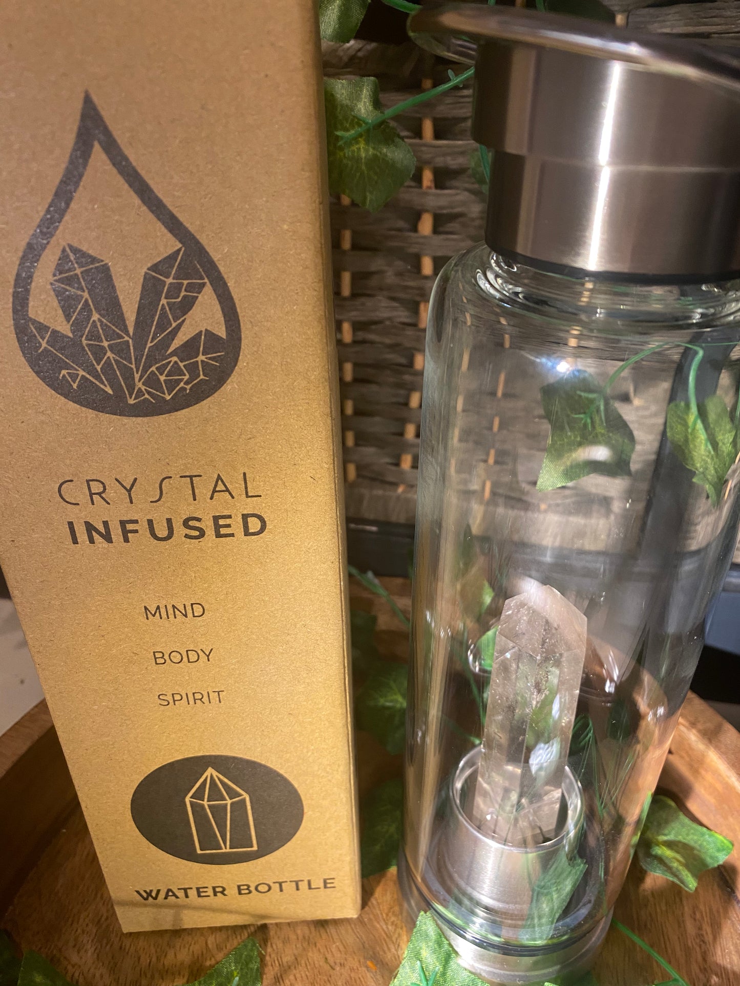 Crystal infused glass bottle